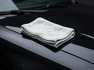 Microfibre cloth on a car’s bodywork